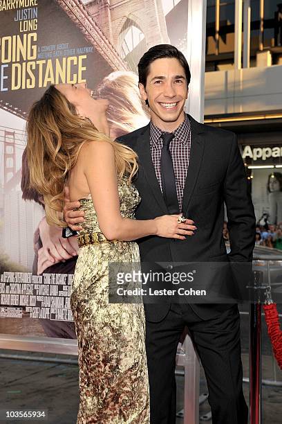 Actors Drew Barrymore and Justin Long attend the "Going The Distance" Los Angeles premiere red carpet on August 23, 2010 in Los Angeles, California.