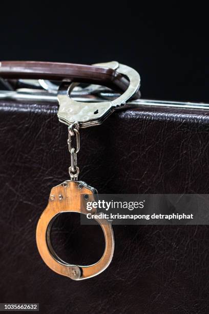 businessmen corrupt concept,shackle,business bag - corruption abstract stock pictures, royalty-free photos & images