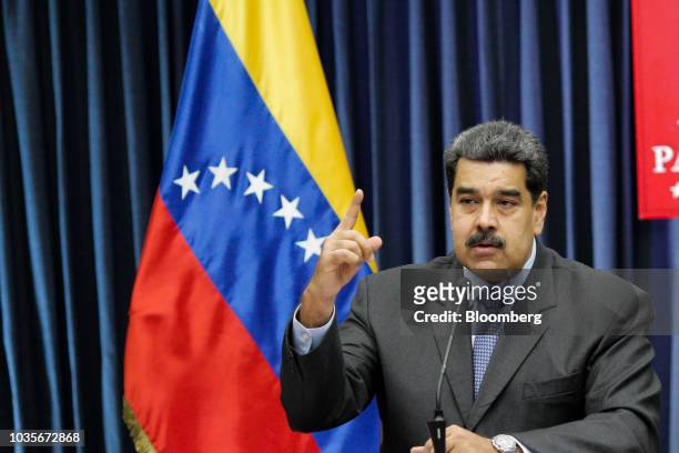 Nicolas Maduro, Venezuela's president, speaks during a press conference at the presidential palace in Caracas, Venezuela, on Tuesday, Sept. 18, 2018....
