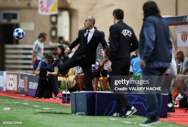 Monaco's Portuguese coach Leonardo Jardim controls the ball during the UEFA Champions League first round football match between AS Monaco and...