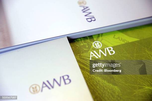 Ltd. Brochures are arranged for a photograph in Melbourne, Australia, on Tuesday, Aug. 24, 2010. Agrium Inc., bidding A$1.2 billion in cash for AWB...