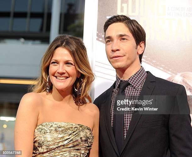 Actors Drew Barrymore and Justin Long arrive at the premiere of Warner Bros. "Going The Distance" held at Grauman's Chinese Theatre on August 23,...