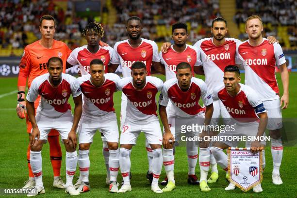 Monaco's French defender Djibril Sidibe, Monaco's Belgian midfielder Youri Tielemans, Monaco's French midfielder Samuel Grandsir, Monaco's German...