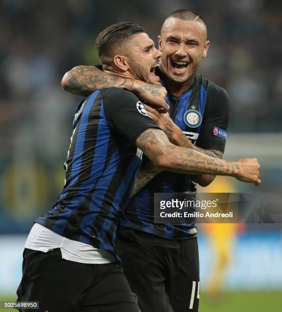 Mauro Emanuel Icardi of FC Internazionale celebrates his goal with his team-mate Radja Nainggolan during the Group B match of the UEFA Champions...