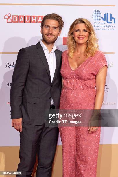 Benjamin Baarz and Nina Bott attend the Deutscher Radiopreis at Schuppen 52 on September 6, 2018 in Hamburg, Germany.