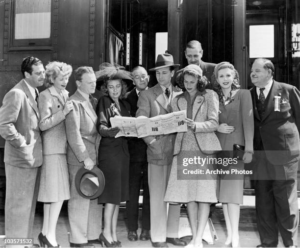 Group of film stars leave for Ensenada, in Baja California, to entertain Mexico's troops, circa 1942. From left to right, Mark Sandrich, Lucille...