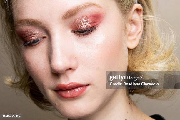 Model, make up detail, is seen backstage ahead of the Luisa Spagnoli show during Milan Fashion Week Spring/Summer 2019 on September 18, 2018 in...