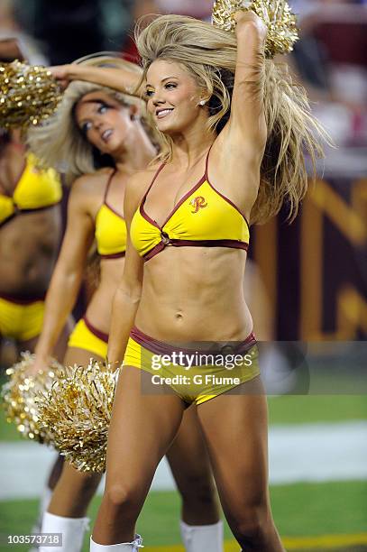 Redskins cheerleaders perform during the preseason game between the Washington Redskins and the Baltimore Ravens at FedExField on August 21, 2010 in...