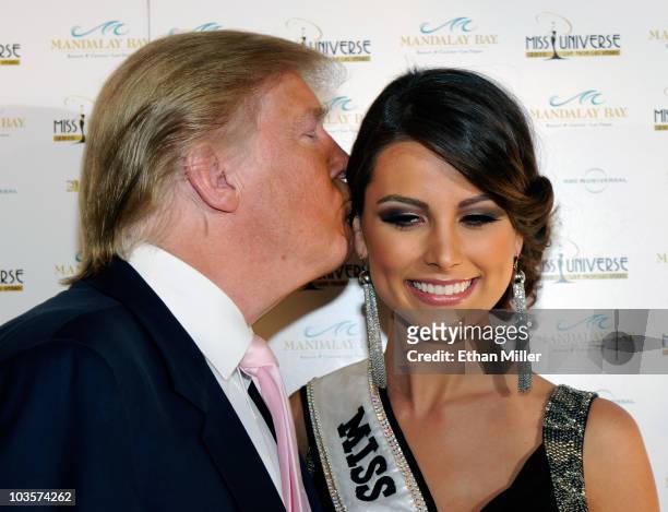 Donald Trump kisses Miss Universe 2009 Stefania Fernandez as they arrive at the 2010 Miss Universe Pageant at the Mandalay Bay Events Center August...