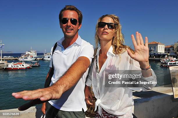 Prince Nikolaos of Greece and Tatiana Blatnik pose on the old harbour on August 24, 2010 in Spetses, Greece.