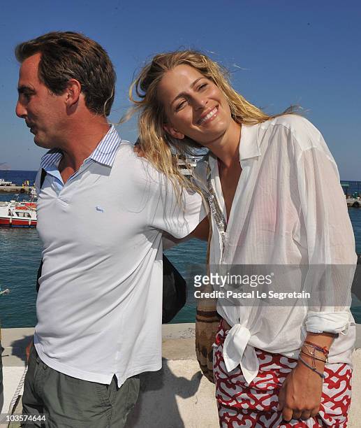 Prince Nikolaos and Tatiana Blatnik pose on the old harbour on August 24, 2010 in Spetses, Greece.