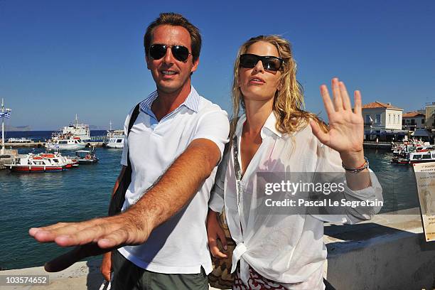 Prince Nikolaos and Tatiana Blatnik pose on the old harbour on August 24, 2010 in Spetses, Greece.