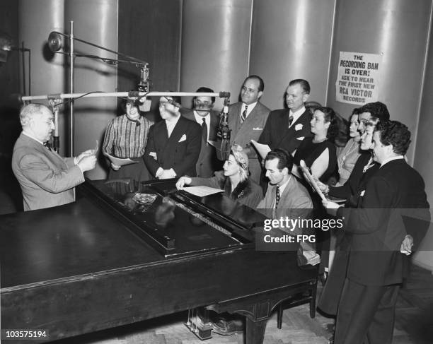 James C. Petrillo , far left, President of the American Federation of Musicians, pictured during the first recording session after a contract between...