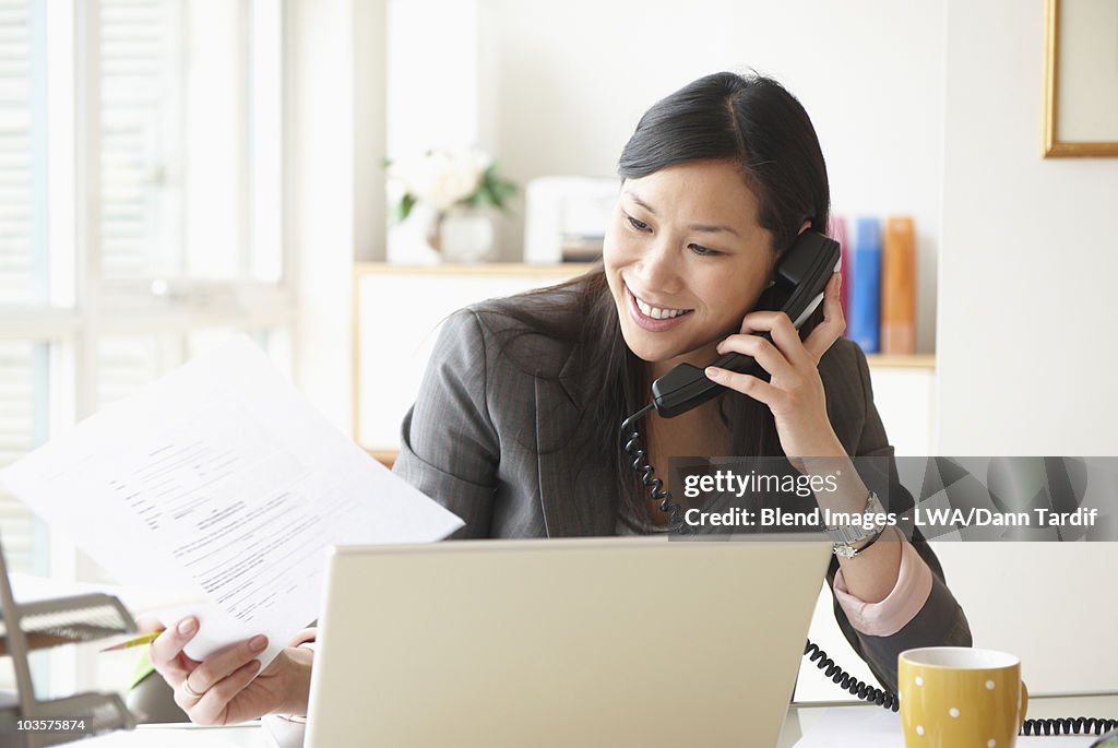 Chinese businesswoman working at desk