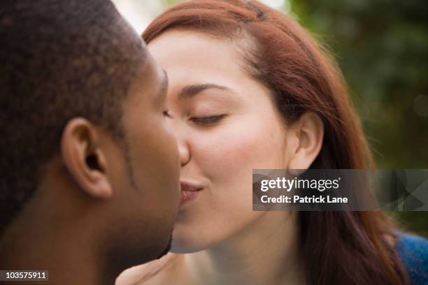 couple kissing - black women kissing white men stock pictures, royalty-free photos & images