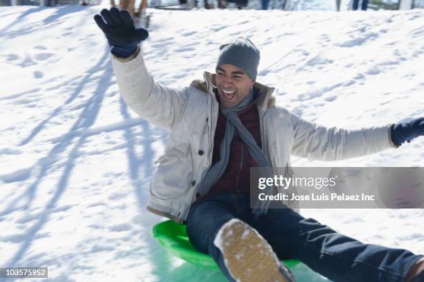 Man Riding Sled 7,582 Man Sledding Stock Photos, High-Res Pictures, and Images - Getty ...