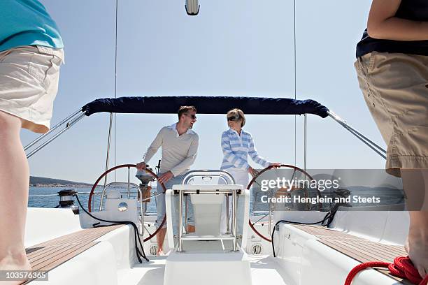 family on yacht - father son sailing stock pictures, royalty-free photos & images