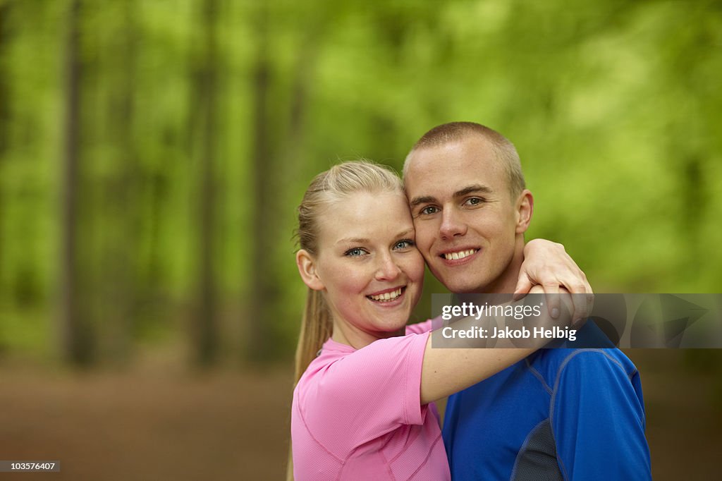 Couple running, standing together