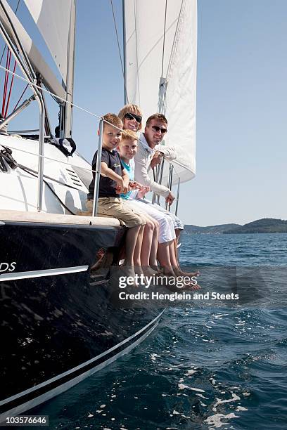 family on yacht - kid sailing stock-fotos und bilder