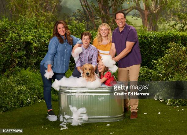 Walt Disney Television via Getty Images's "American Housewife" stars Katy Mixon as Katie Otto, Daniel DiMaggio as Oliver Otto, Julia Butters as...