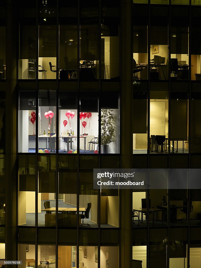 Empty office after party, view from building exterior