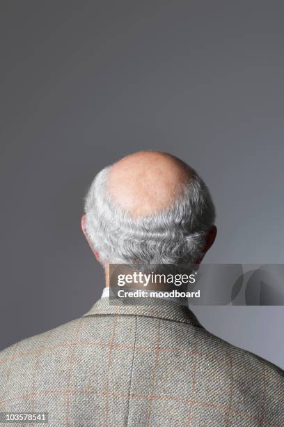 senior man in studio, head and shoulders, back view - man rear view grey hair closeup stock pictures, royalty-free photos & images