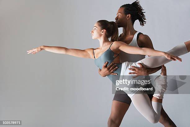 ballet dancer supporting ballerina - ballet dancer lift stock pictures, royalty-free photos & images