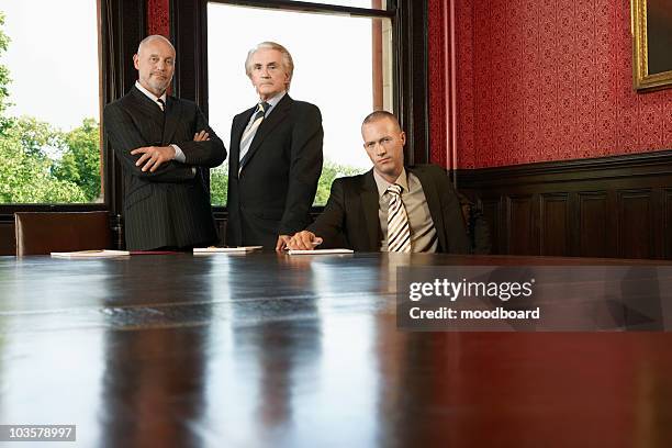 men in conference room - lawyers serious stock pictures, royalty-free photos & images