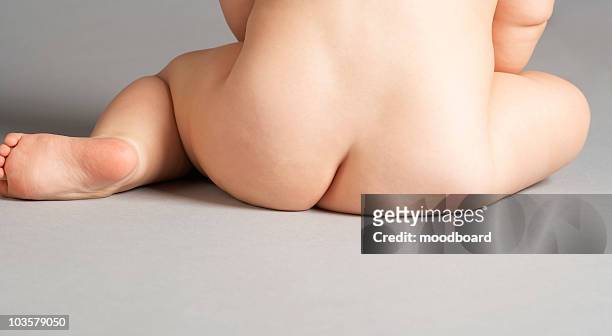 sitting baby - baby bottom stock pictures, royalty-free photos & images