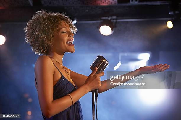 Singer Side 6,330 Stage Side View Stock Photos, High-Res Pictures, and Images ...