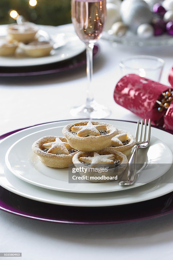 Mince pies on plate on dining table