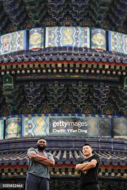 Fighters Li Jingliang of China and Curtis Blaydes of the United States pose for photo during UFC Fight Night Beijing Athlete Tour at Temple of Heaven...