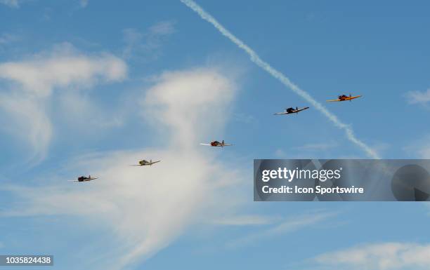 Pilots in the T6 class line up for the start of the Heat race at the 55th National Championship Air Races the only closed course pylon racing event...