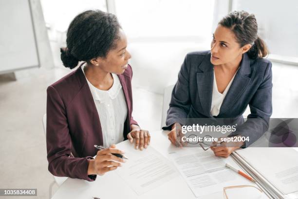 start your career in healthcare - african american interview stock pictures, royalty-free photos & images