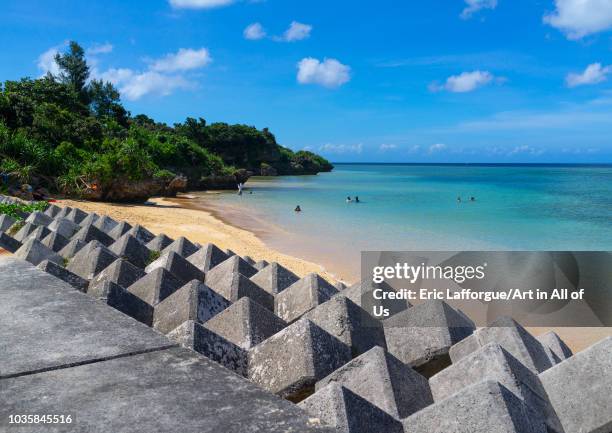 Concrete made tetrapods along Maruma beach, Yaeyama Islands, Iriomote, Japan on August 22, 2018 in Iriomote, Japan.