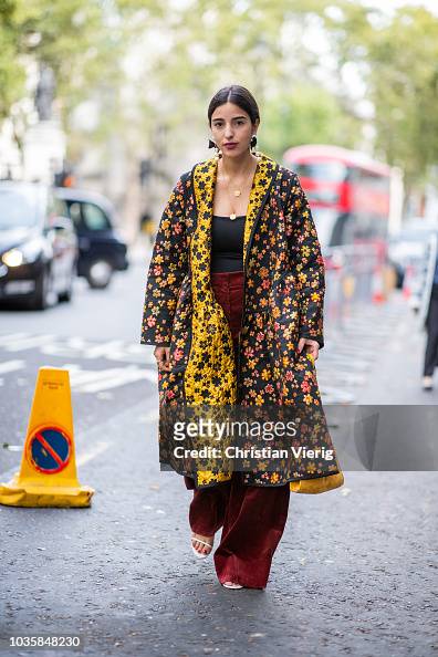 Bettina Looney wearing oversized coat with floral print is seen... News ...