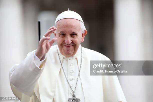 Pope Francis waves to the faithful as he arrives in St. Peter's square for his weekly audience on September 19, 2018 in Vatican City, Vatican. During...