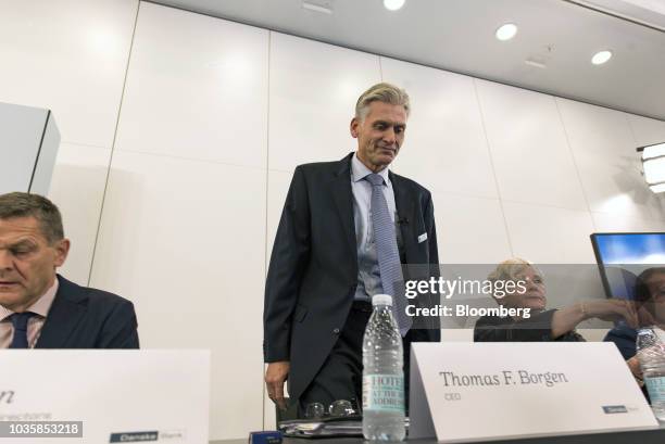 Thomas Borgen, chief executive officer of Danske Bank A/S, center, arrives for a news conference in Copenhagen, Denmark, on Wednesday, Sept. 19,...