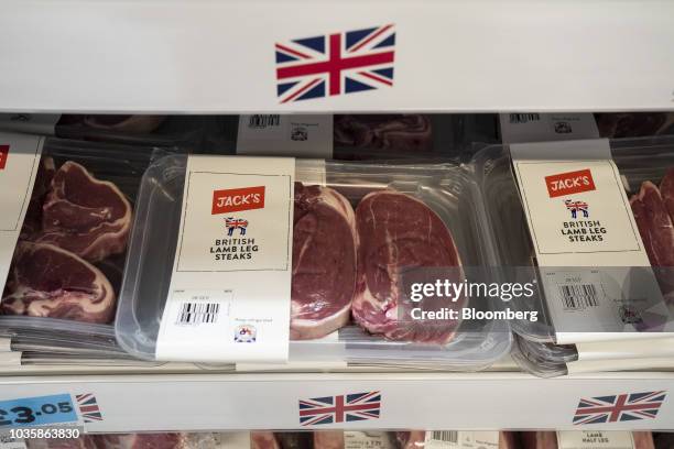 Packets of British lamb leg steaks sit on display on a shelf in a refrigerated cabinet inside a newly opened 'Jack's' discount store, operated by...