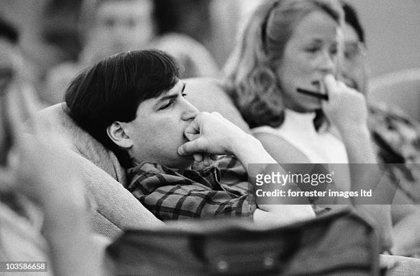 NeXT CEO Steve Jobs listening to a presentation at a NeXT company retreat in June, 1988 held at the Chaminade Resort in Santa Cruz, CA.