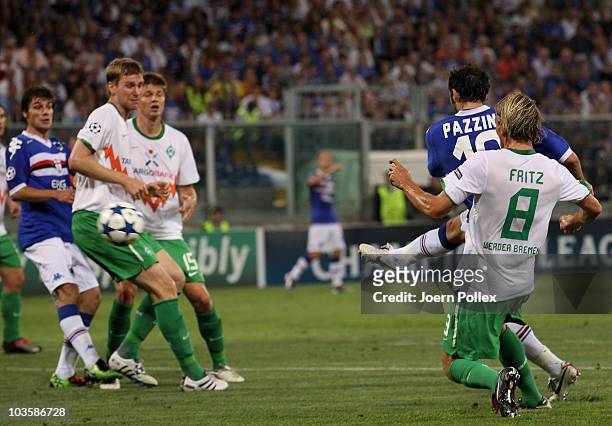 Giampaolo Pazzini of Genua scores his team's second goal during the Uefa Champions League qualifying second leg match between Sampdoria Genua and...