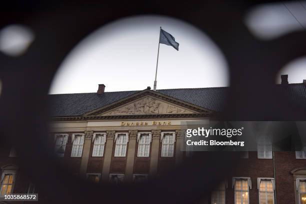 Flag flies above the headquarters of Danske Bank A/S in Copenhagen, Denmark, on Tuesday, Sept. 18, 2018. Danske Bank A/S Chief Executive...