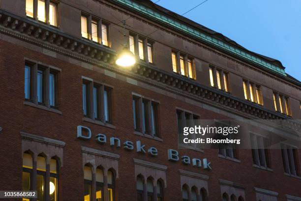 Logo sits on display outside the Danske Bank A/S finance center in Copenhagen, Denmark, on Tuesday, Sept. 18, 2018. Danske Bank A/S Chief Executive...