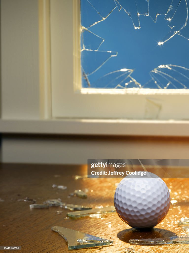 Ball Break Window Golf Ball And Broken Window High-Res Stock Photo - Getty Images