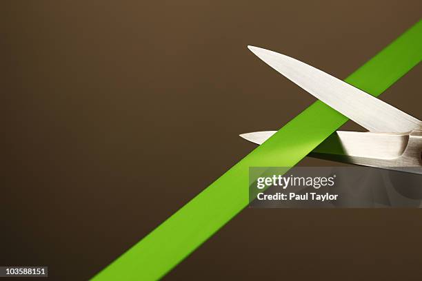 green ribbon-cutting - slash stock pictures, royalty-free photos & images