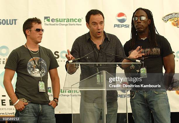 Bassist Stefan Lessard, Singer/Guitarist Dave Matthews and Violinist Boyd Tinsley of Dave Matthews Band in the press room during Live Earth New York...