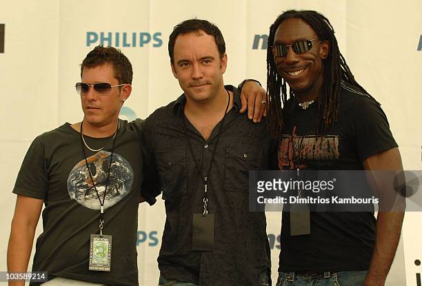 Bassist Stefan Lessard, Singer/Guitarist Dave Matthews and Violinist Boyd Tinsley of Dave Matthews Band in the press room during Live Earth New York...