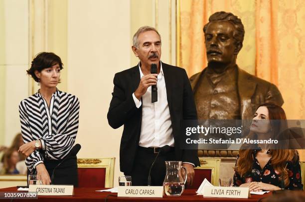 Cristina Tajani, Carlo Capasa and Livia Firth attend Green Carpet Fashion Awards press conference during Milan Fashion Week Spring/Summer 2019 at...