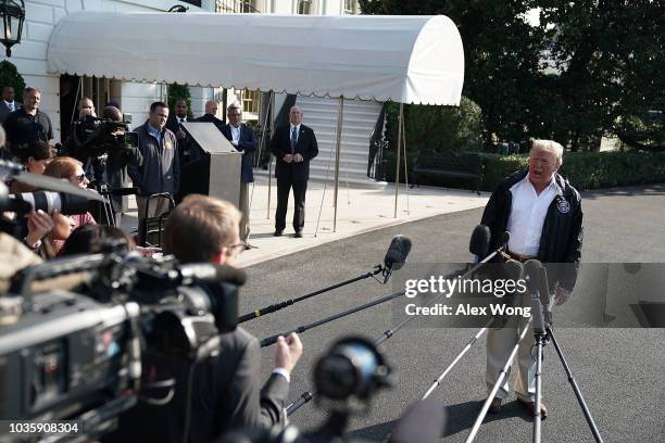 President Donald Trump speaks to members of the media prior to a Marine One departure at the South Lawn of the White House September 19, 2018 in...