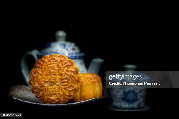 Mooncakes are offered to friends or on family gathering during the mid-autumn festival / Mooncake/ The Chinese character on the mooncake represent 